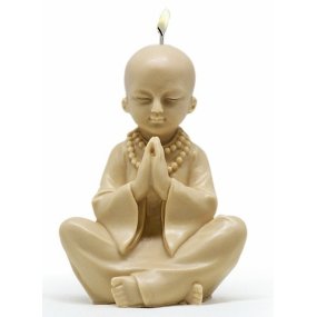 Enfant Bouddha moulé priant pour des bougies Enfant Bouddha moulé priant pour des bougies