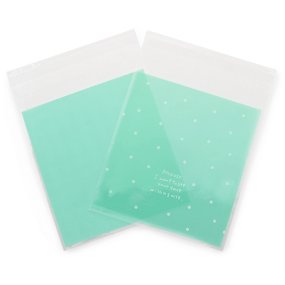 Bolsa celofane verde com bolinhas brancas Bolsa celofane verde com bolinhas brancas