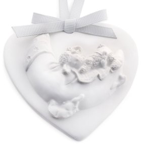 Detalhe de Batizado, figura perfumada Lua. Detalhe de Batizado, figura perfumada Lua.