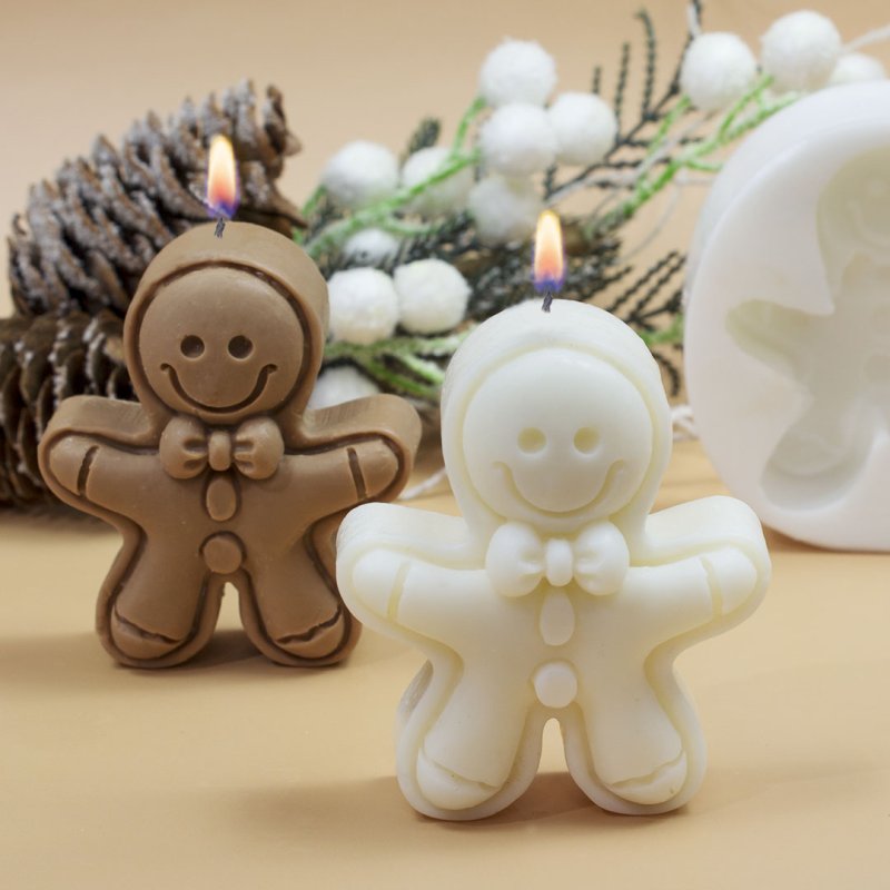 Kit para fazer 2 velas de boneco de biscoito de Natal. Materiais e instruções