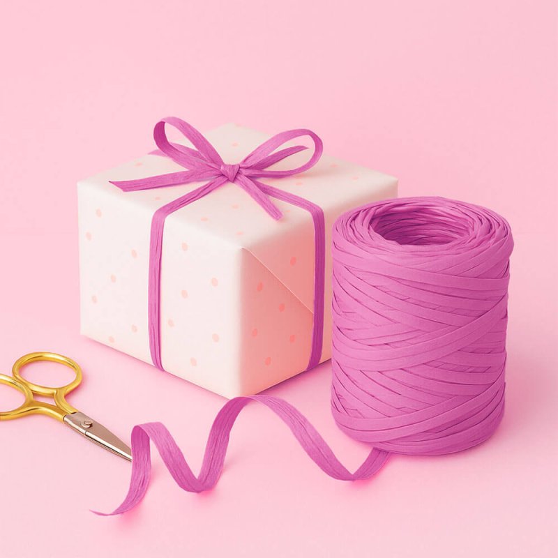 Cinta de rafia magenta para envolver regalos