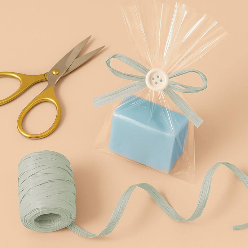 Cinta de rafia gris perla para decorar bolsas de regalo