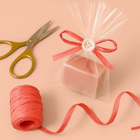 Cinta de rafia coral para decorar bolsas de regalo