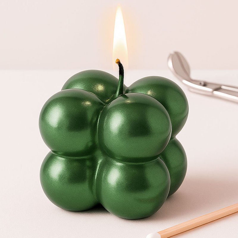 Vela con barniz verde metalizado