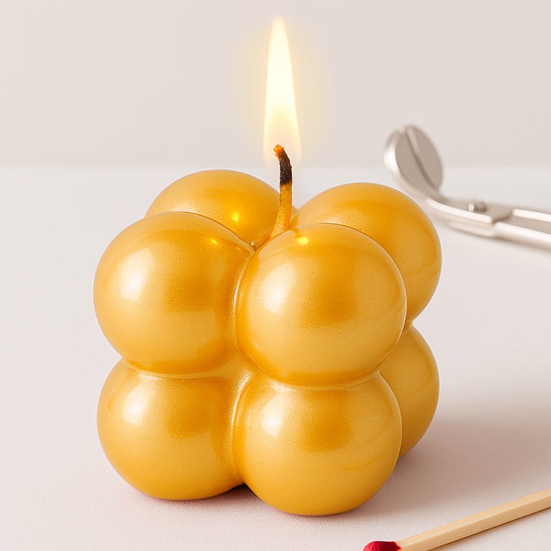 Vela con barniz amarillo mango metalizado