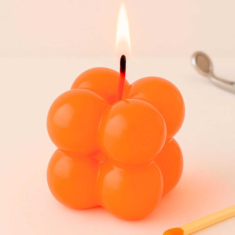 Vela con barniz naranja claro neón
