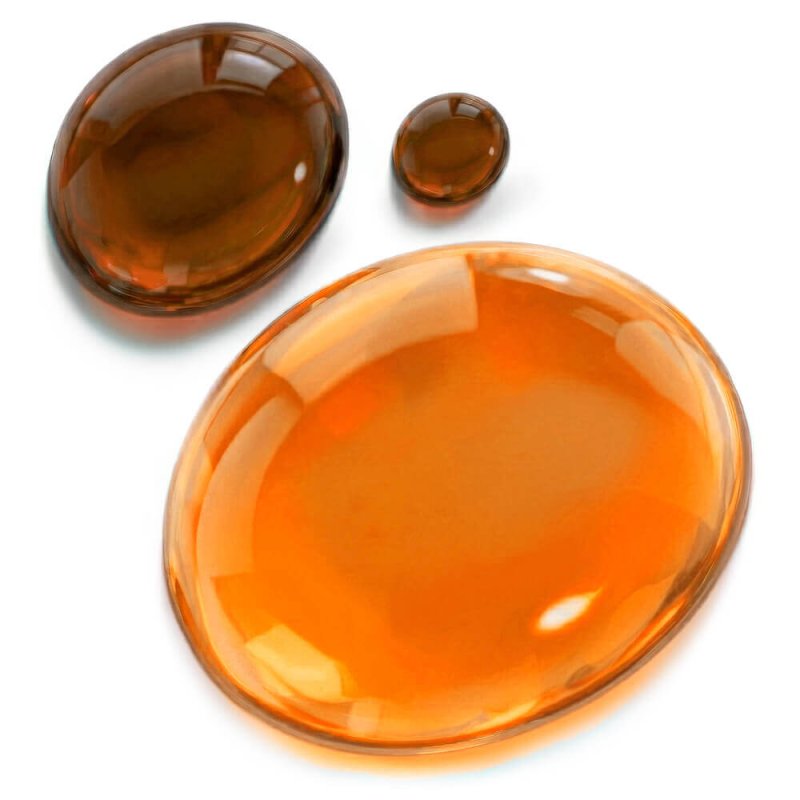 Gota con colorante concentrado liquido marron caramelo con muestra de gota