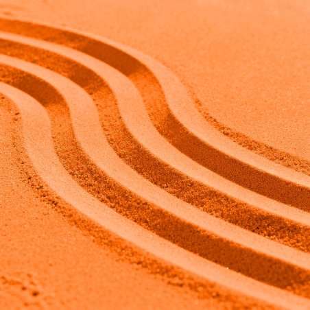 Arena fina naranja decorativa