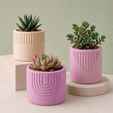 Maceteros decorativos hechos con cemento para figuras rosa blush