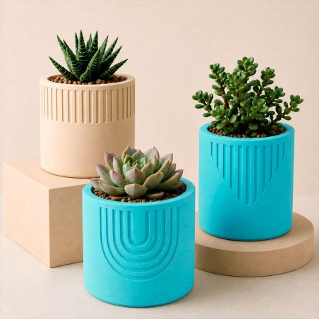 Maceteros decorativos hechos con cemento para figuras azul turquesa