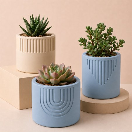 Maceteros decorativos hechos con cemento para figuras azul