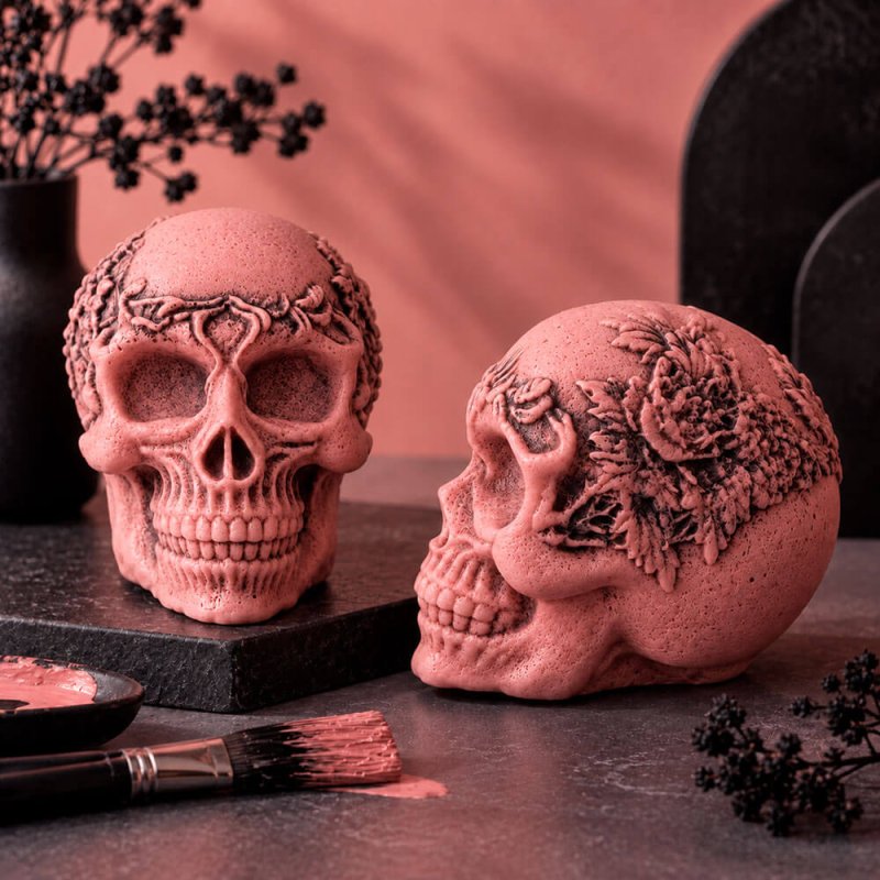 Figuras de cemento calavera con corona de flores