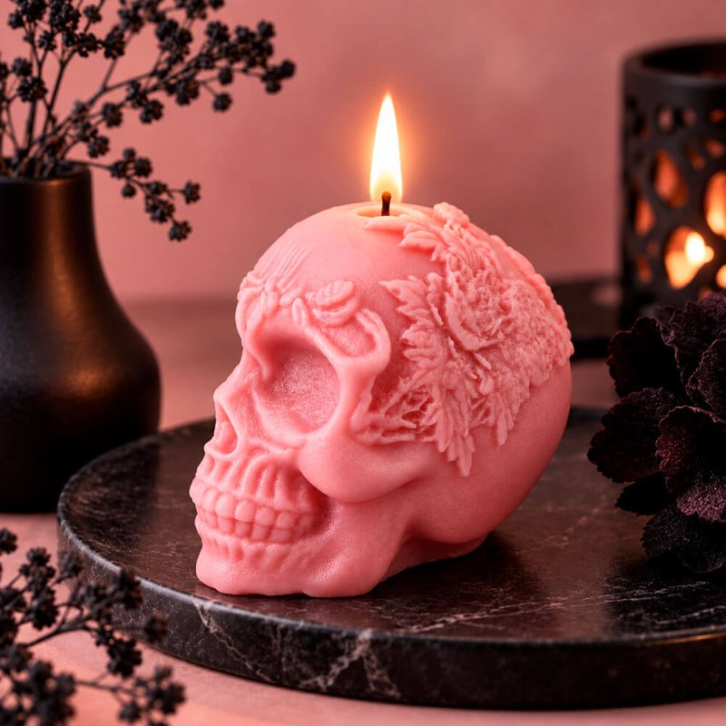 Vela calavera con corona de flores