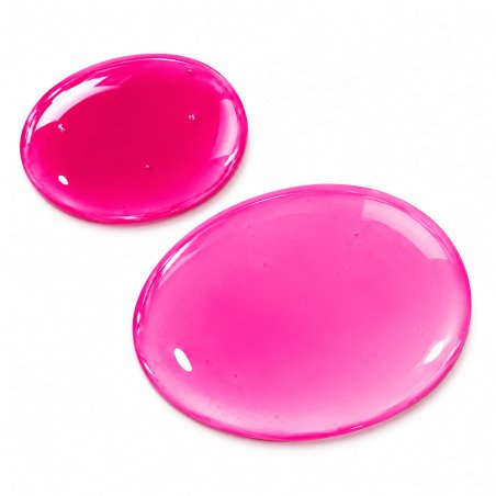 Muestra de colorante magenta floxina hidrosoluble polvo con agua