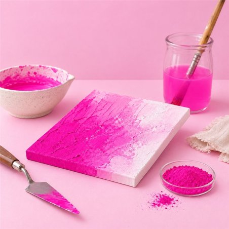 Pigment fuchsia néon: peinture texturée, spatule et bol de pigment