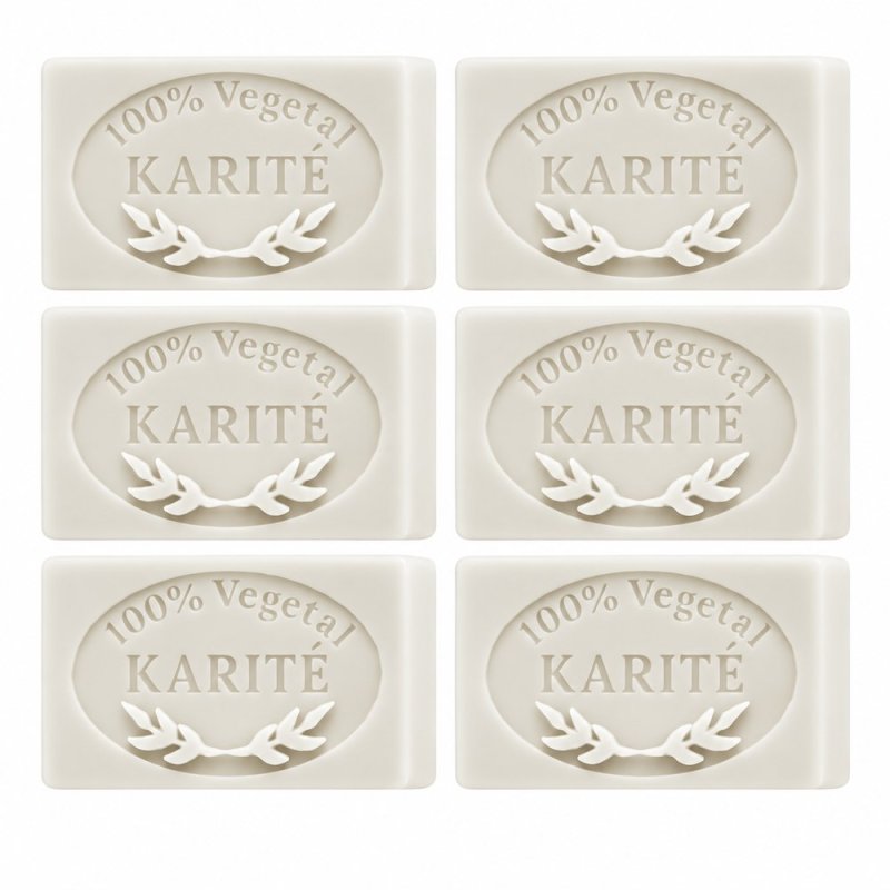 Jabón de karité hecho con molde: seis pastillas sobre fondo blanco