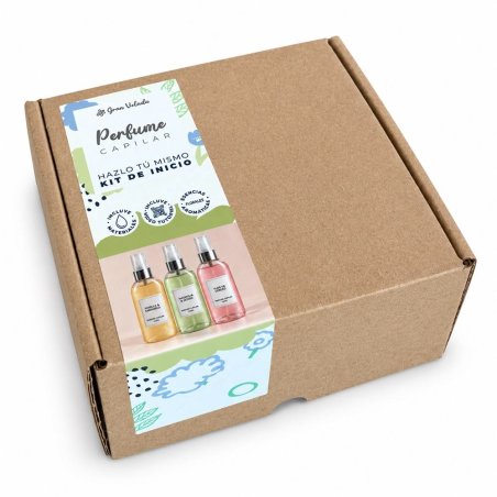 Caixa do kit para fazer perfume capilar sobre fundo branco