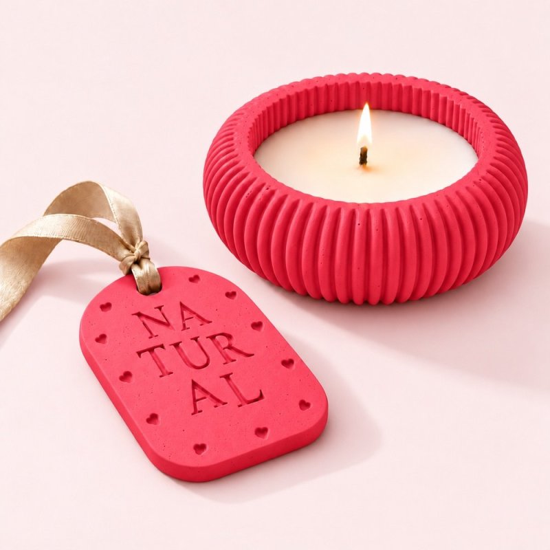 Portavelas y placa aromática de escayola en coral con cinta beige