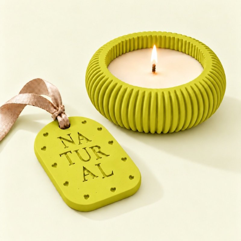 Portavelas y placa aromática de escayola en amarillo verdoso con cinta beige