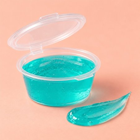 Boião 50 ml para jelly wax melts aberto com tampa sobre fundo pastel