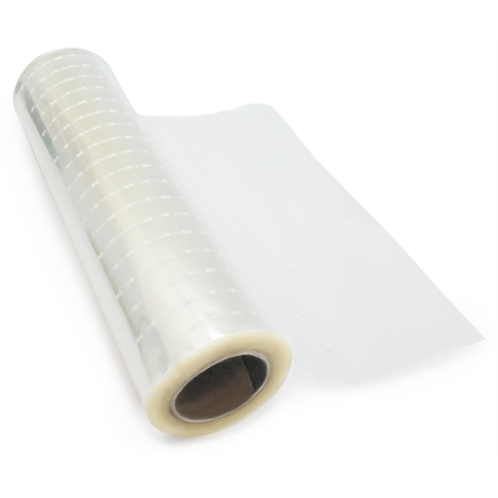 Rollo de celofan con topitos blancos